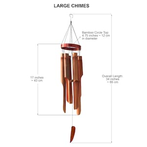 May include: A large wooden wind chime with 7 tubes, a wooden top ring, and a brown wooden finial. The chime is 34 inches (86 cm) long and the top ring is 4.75 inches (12 cm) in diameter.