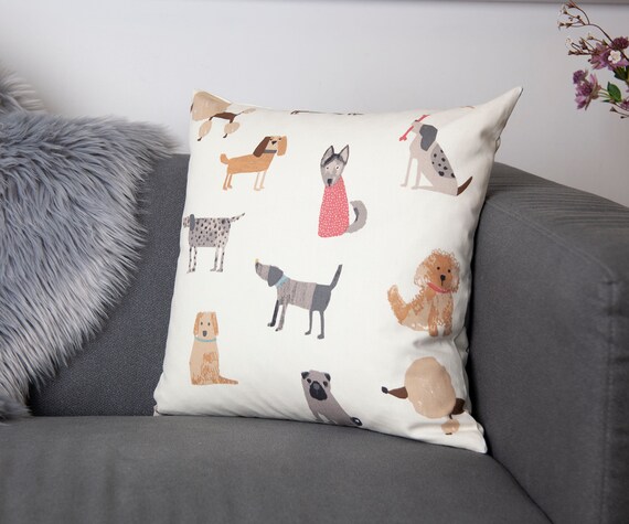 Cushion with dogs, on a neutral background, fits an 18 inch pad (45cm).  concealed zip, Print on both sides. cotton, quirky dog breeds.