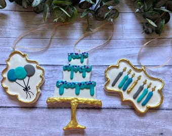 Blue Birthday ornaments, each sold separately