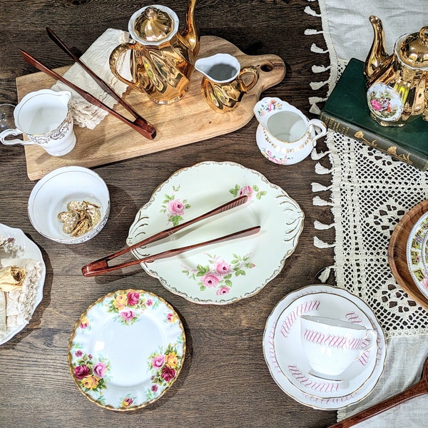 Vintage Dinnerware. Antique Ceramic China Tableware. Gold/Pink/White/Green Teacups, Saucers, Plates, Tea Pot, Coffee Pot, Milk Jug.