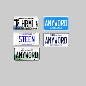 May include: A collection of license plate stickers featuring various designs and text. The stickers include plates from North Carolina, Bahamas, Washington DC, Quebec, and Tennessee. Each plate has a unique design and text.