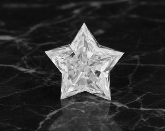 May include: A clear, faceted star-shaped gemstone with sharp points. The gem is highly reflective, showcasing internal facets and a brilliant sparkle. The star is set against a dark, marbled surface, enhancing its luminosity. The overall effect is one of elegance and precision.