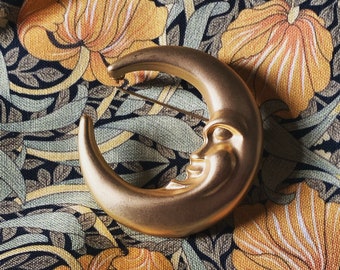 Gold tone vintage crescent moon brooch