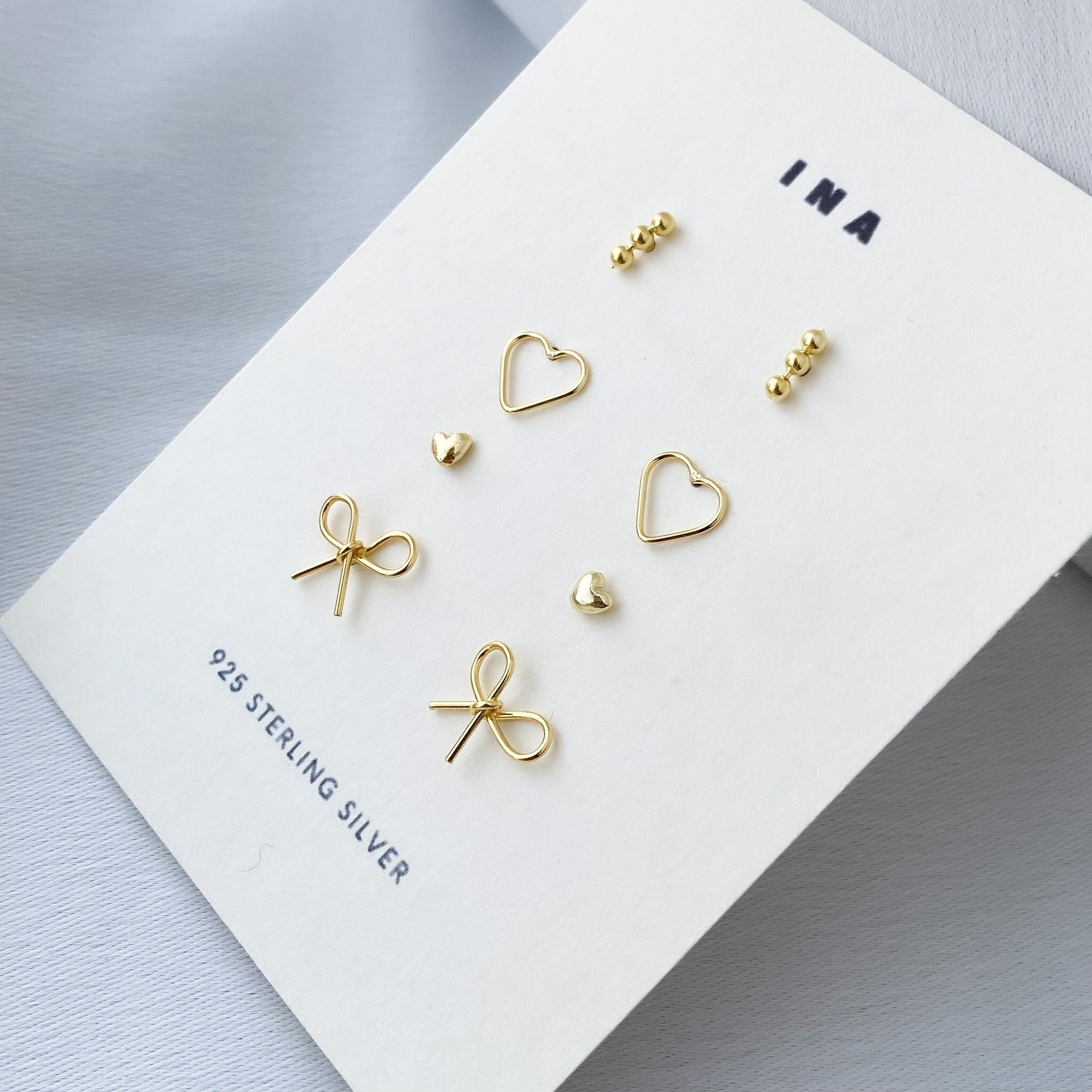 Gold and hotsell silver studs