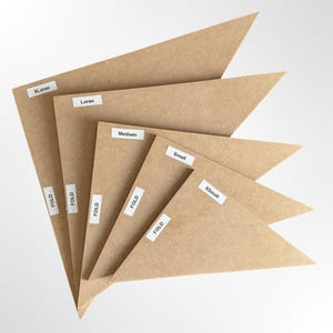 May include: Five brown cardboard triangles of different sizes labelled "XL-Large", "Large", "Medium", "Small", and "X-Small". Each triangle has the word "FOLD" written on it.