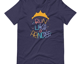 May include: Navy blue t-shirt featuring a gold crown and the text "Run Like a Princess" in colourful lettering.