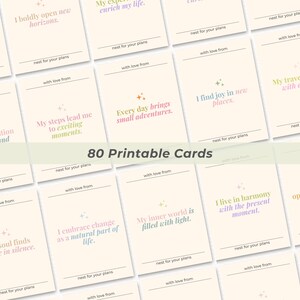 May include: A collection of 80 printable cards with inspirational quotes in various pastel colors. Each card features a unique message, such as "I find joy in new places" and "Every day brings small adventures." The cards are designed with a minimalist aesthetic.