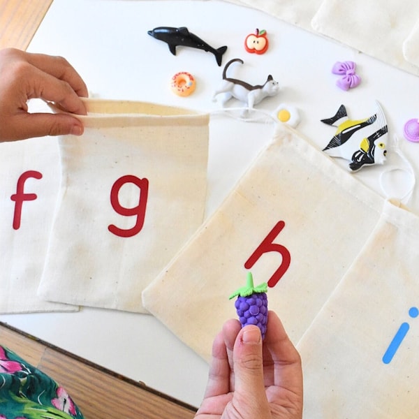 Montessori language objects ABC trinkets alphabet letter sound initial mini objects speech therapy I spy game montessori preschool phonics