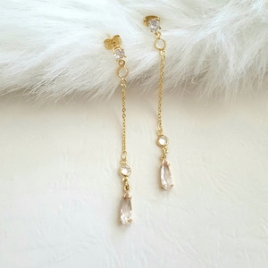 Long dangle bridal earrings. Gold crystal teardrop earrings. Drop long chain earrings. Long linear earrings. Simple wedding earrings.