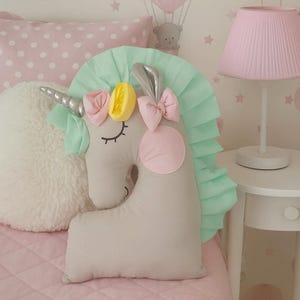 Handmade unicorn pillow: decorative cushion for nursery