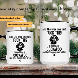 May include: Two white ceramic mugs with black handles and rims. Each mug features a black graphic of a Cockapoo dog and the text: and the wise one said FUCK THIS I'm getting a COCKAPOO and lived happily ever after. Available in 11oz and 15oz sizes.