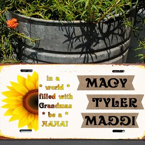 In a world full of grandmas be a Nana Grammy Mimi metal sign sunflower Customize your own!! 6&quot; x 12&quot; license plate