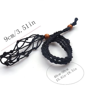 May include: Black woven water bottle holder with wooden beads. The holder is 9cm/3.51in long and the strap is 40-50cm/15.6in-19.5in. The holder is designed to carry a water bottle.