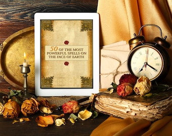 May include: A white tablet with a vintage-style book cover displaying the text "50 of the most powerful spells on the face of earth". The tablet is surrounded by dried roses, an antique clock, a candle, and a stack of old books on a wooden surface.