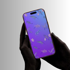May include: A smartphone with a copper-colored frame displaying a vibrant purple background screen. The screen features a repeating pattern of light pink flowers and delicate green palm leaves scattered across the surface in a botanical design.