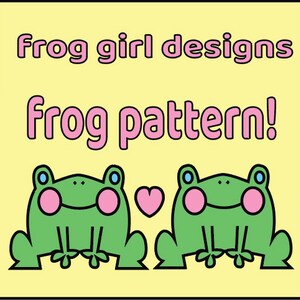 May include: Two green frogs with pink cheeks and blue eyes are sitting side-by-side. They are facing each other and there is a pink heart between them. The text "frog girl designs frog pattern!" is written in pink letters on a yellow background.