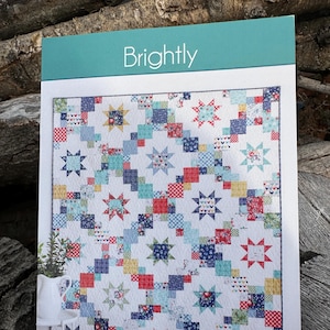 Brightly A Layer Cake or Fat Quarter Quilt Pattern, By Cluck Cluck Sew.