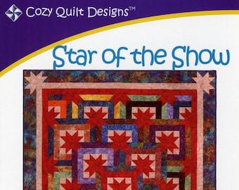 May include: A quilt pattern titled "Star of the Show" designed by Georgette Dell'Orco. The pattern is for a quilt made with 2 1/2 inch strips and includes instructions for wall hanging, throw, twin, queen, and king sizes.