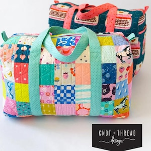 May include: Two patchwork duffel bags, one teal and pink with a typewriter print and the other with a colorful patchwork design. The bags are made of fabric and have a quilted texture. The text "PATCHWORK DUFFLE" is written in black at the top of the image. The text "KNOT + THREAD design" is written in white on a black background at the bottom of the image.