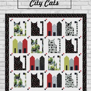 May include: A quilt titled City Cats featuring a repeating grid pattern of stylized cat silhouettes and house shapes. The design incorporates various fabrics with black, white, red, green, and gray colors, finished with a black border with small motifs.