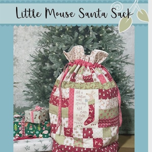 May include: A fabric drawstring sack featuring a patchwork design in shades of red, green, and white with a central panel displaying a mouse in a stocking and the text: Not a creature was stirring. Not even a cute little mouse.