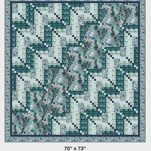 May include: A quilt titled "Stretched Cabins" with a repeating geometric pattern in shades of teal, blue, and gray. The quilt measures 70 inches by 73 inches. The quilt has a dark blue border and the text "Stretched Cabins" is at the top.