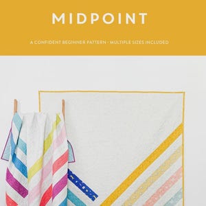 May include: A white quilt with colorful diagonal stripes and a matching quilt hanging on a wooden rack. The text "MIDPOINT" is displayed above the phrase "A CONFIDENT BEGINNER PATTERN - MULTIPLE SIZES INCLUDED". The top of the image reads "COTTON AND JOY PATTERNS".