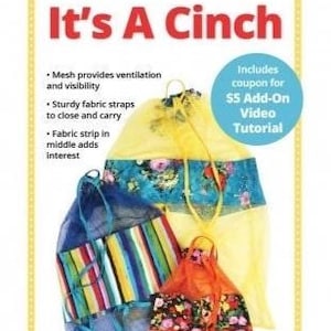 May include: Three mesh cinch bags in blue, yellow, and orange, each with a floral or striped design. The bags have sturdy fabric straps and a fabric strip in the middle. Text on the image reads "It's A Cinch" and includes a coupon for a video tutorial.