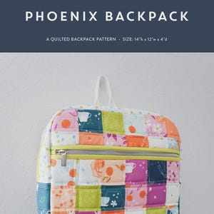 May include: A quilted Phoenix backpack pattern with a patchwork design. The backpack is approximately 14 inches high, 12 inches wide, and 4 inches deep. The design includes floral and geometric patterns with a yellow zipper.