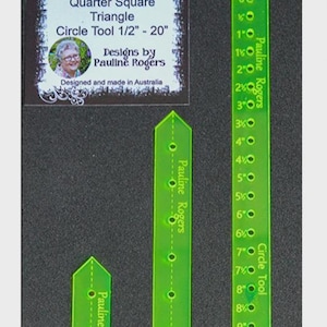 May include: A set of green quilting tools with measurements and the text "Precision Quilt Wonders." The tools include a half-square triangle, quarter-square triangle, and circle tool. Designed by Pauline Rogers.