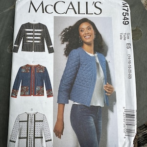 May include: McCall's M7549 sewing pattern envelope featuring illustrations of four jacket variations labeled A, B, C, and D. The cover displays a blue quilted jacket, a black polka dot jacket, a denim jacket with patterned panels, and a white grid jacket.