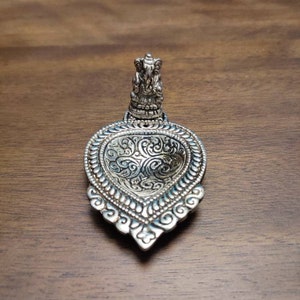 Ganesha Incense Stick Holder: Alloy Banyan Leaf Design