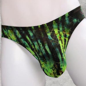 May include: Green and black patterned underwear with a tie-dye design.