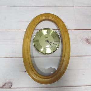 Vintage Working wooden Oval Scania Quartz Wall Mount Clock, West Germany