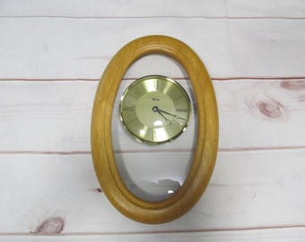 Vintage Working wooden Oval Scania Quartz Wall Mount Clock, West Germany