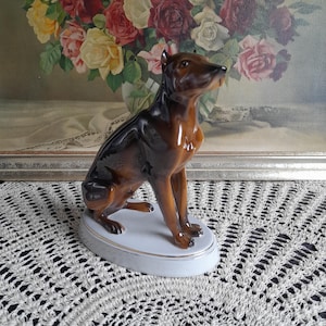 Vintage Royal Dux Tall statue of Sitting dog stamped Šlauf, hand painted