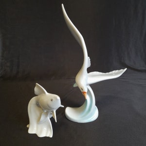 Vintage figurines white fish and seagull with a manufacturing defect on the wing, Hungarian Hollohaza porcelain figurine, hand painting