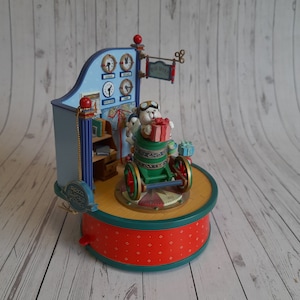 Vintage Enesco wind-up Music Box 1992 bear with gifts, cannon bear, Post office, works and plays Jingle Bells