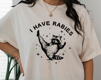 Maglietta Raccoon I Have Rabies Retro Y2k Boho Maglietta Criptozoologia Sovrastimolata Mi fa male la pancia Mangia il ricco Maglietta Raccoon Cose strane