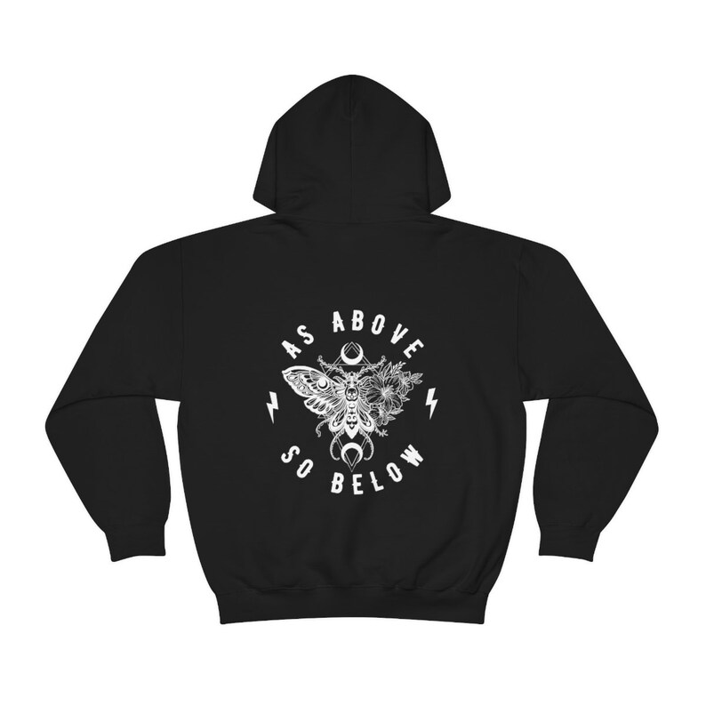 May include: Black hooded sweatshirt with a white graphic print of a moth with wings spread, flowers, and the text "As Above So Below".