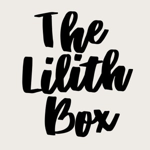 May include: The Lilith Box text in black script on a cream background. The text is in a bold, handwritten style, with the words stacked vertically. The background is a solid, neutral color.