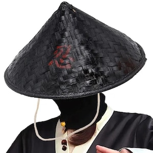 May include: A conical hat made of black woven material with a pointed top and a wide brim. The hat features a red kanji character printed on the front surface. A light-colored chin strap with a small wooden bead is attached to the underside of the hat.