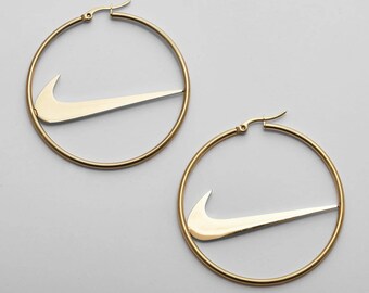 nike ear studs