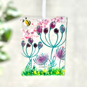 Fused glass pink flower suncatcher with bee. Glass hanger.