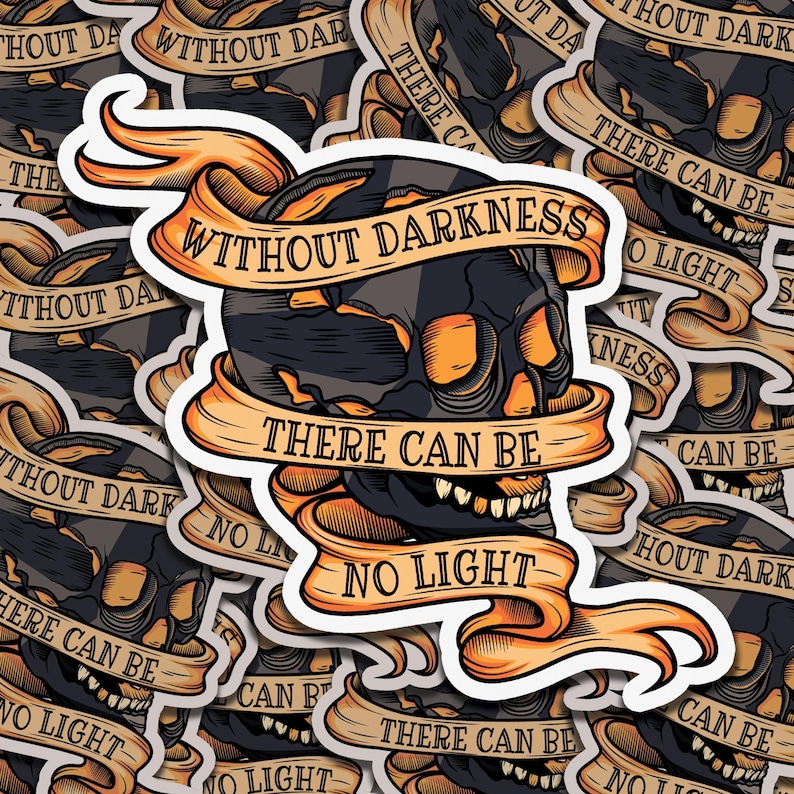 May include: A sticker with a skull and crossbones design. The skull is black and orange, and the crossbones are black. The sticker has the text "Without darkness there can be no light" written on it in a banner style.