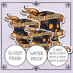 May include: Three glossy, water-proof stickers with a skull graphic and the text "Without darkness there can be no light". The stickers are available in three sizes: 110mm x 90mm, 90mm x 70mm, and 70mm x 50mm.