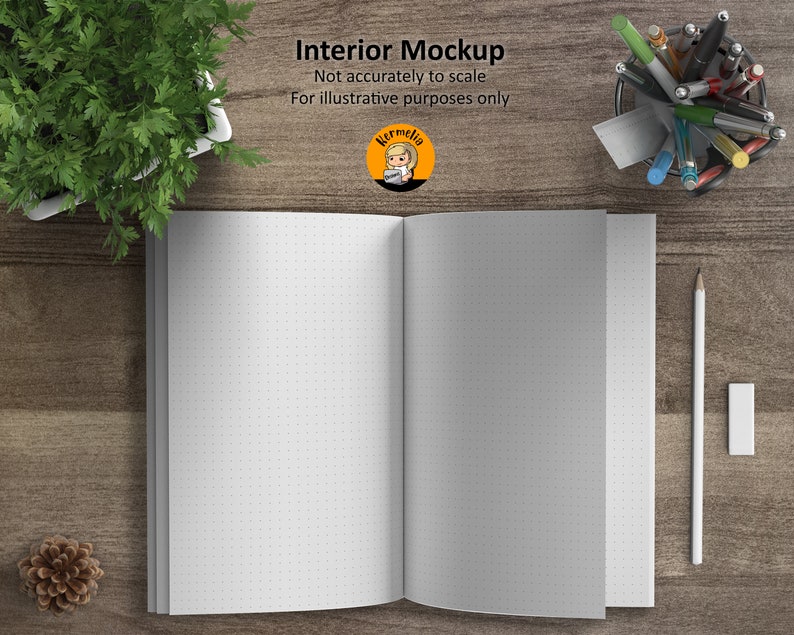 May include: A white notebook with a dotted pattern on the pages is open and lying flat on a wooden surface. The notebook is surrounded by a pencil, a white eraser, and a container of pens.