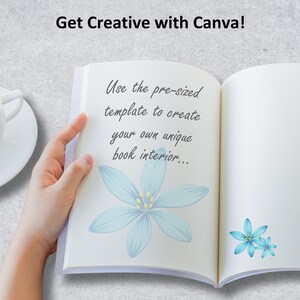 May include: An open notebook with a white background and blue flowers. The text "Use the pre-sized template to create your own unique book interior..." is written on the left page.