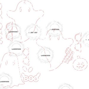 May include: A white outline of a ghost with the word "BOO" written underneath. There are several circles with the text "LASERFOOD" and "J.SEP 'OO" inside. There is also a pumpkin and a spider web.