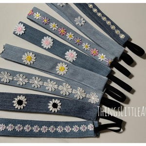 May include: A set of three ceramic mugs with a speckled, matte finish. The mugs are in shades of cream, light gray, and dark gray. Each mug has a simple, minimalist design, perfect for coffee or tea.